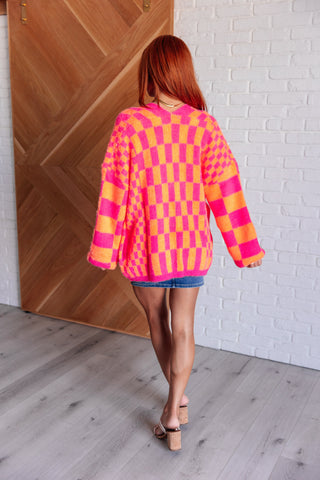 Noticed in Neon Checkered Cardigan in Pink and Orange