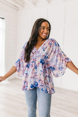 Fabled in Floral Draped Peplum Top in Blue - Crazy Daisy Boutique