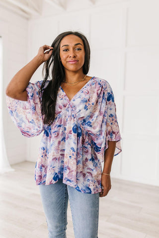Fabled in Floral Draped Peplum Top in Blue - Crazy Daisy Boutique