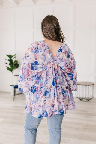 Fabled in Floral Draped Peplum Top in Blue - Crazy Daisy Boutique