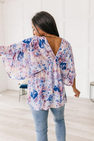 Fabled in Floral Draped Peplum Top in Blue - Crazy Daisy Boutique