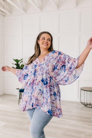 Fabled in Floral Draped Peplum Top in Blue - Crazy Daisy Boutique