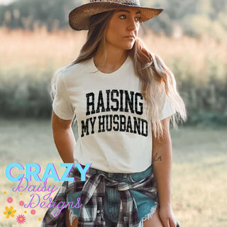 Raising My Husband Graphic T-Shirt - Crazy Daisy Boutique
